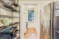 pantry leads to the laundry room