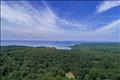 3 acres with expansive water views of the Atlantic.