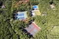 Aerial view of tennis courts & pool