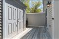 Storage shed, outdoor shower and kitchen access.