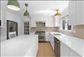 Gourmet kitchen with center island, french door to dining room.