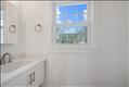 First floor powder room in primary unit.