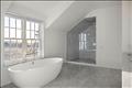 The Farmhouse Primary Bathroom with custom Carrara marble