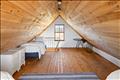 The Bunk House loft with 3 twin beds