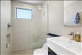 Two renovated bathrooms are shared by the three bedrooms.