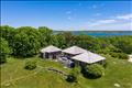 Elegant architectural five bedroom home on 4.5 acres in Aquinnah.