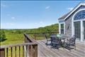 The perfect outdoor oasis for alfresco dining and panoramic coastal views