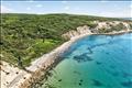 Deeded beach rights to a private, ruggedly beautiful North Shore