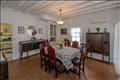 Dining area with energy efficient  mini split heating and cooling systems..