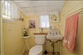 Quaint cottage half bath with classic character