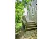 stairs to deck and french door kitchen entry