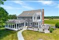 Main house is four bedrooms and offers meadow views.
