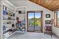 The fourth bedroom has a private balcony.