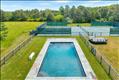 Heated pool and private tennis court.