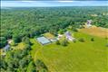 The property is 7.5 acres and comprised of two lots.